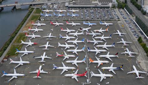 Dozens Of Grounded Max Planes Take Over Boeing Factory Parking Lot