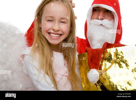 Angel And Santa Claus Stock Photo Alamy