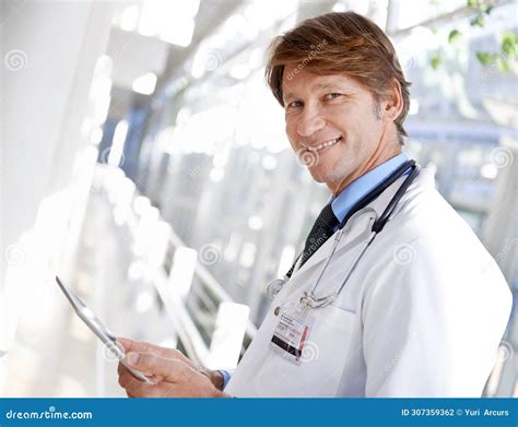 Smile Tablet And Portrait Of Doctor In Hospital Reading Medical Chart For Diagnosis Or