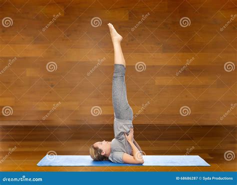 Woman Making Yoga In Shoulder Stand Pose On Mat Stock Image Image Of