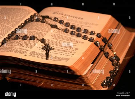 Rosary On A Bible Stock Photo Alamy