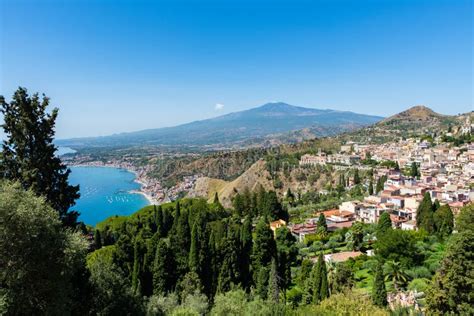 Taormina with the Etna Volcano in the Background Stock Image - Image of ...