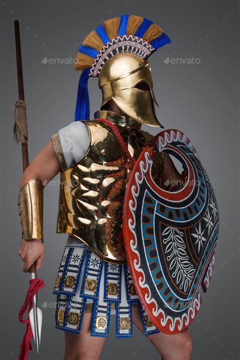 Ancient Greek Warrior With Bronze Plate Armor And Helmet Stock Photo By