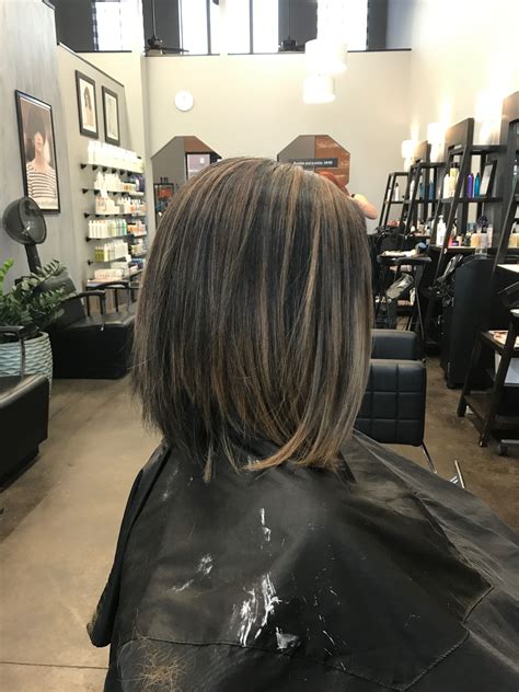 Tutorial explaining how to style a choppy bob long with flat irons 10