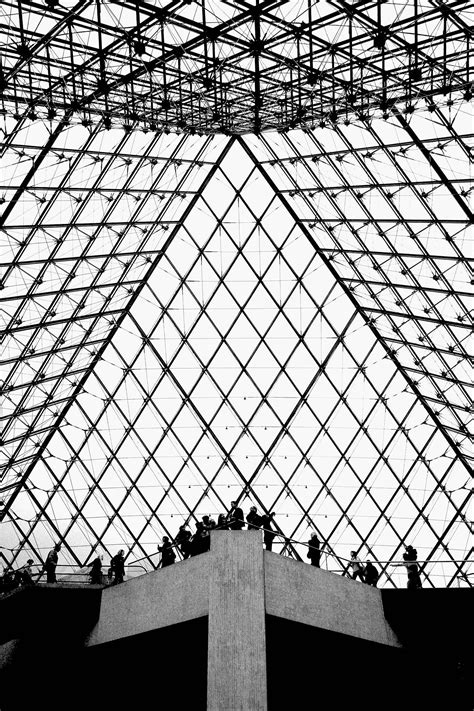 Inside view of the glass pyramid at Musèe du Louvre Paris | Louvre ...