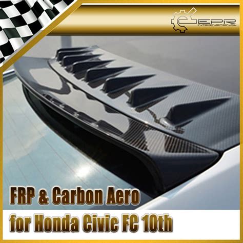 An Advertisement For A Car Show Featuring Carbon Aero Hoods And The