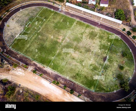 aerial view of rural soccer field stadium in latin America Guatemala ...