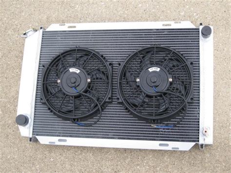 Find ALUMINUM 3 ROW CORE RADIATOR W CAP W 2 X 10 BLACK COOLING FANS 79