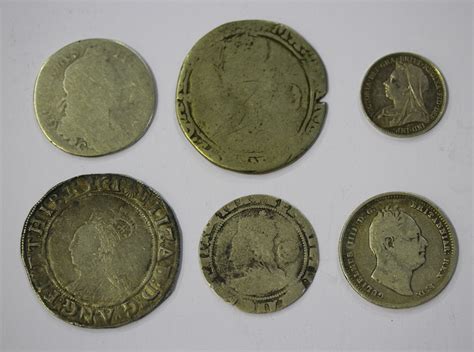 A group of British silver coins, comprising an Elizabeth I shilling ...