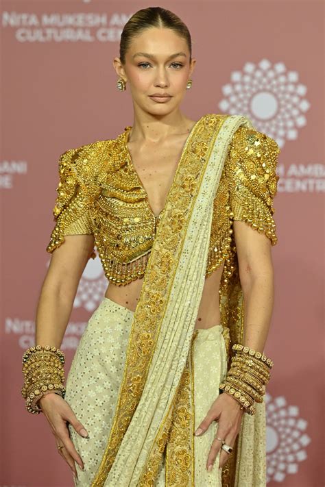 Gigi Hadid Embraces Indian Culture As She Stuns In Golden Sari At Nmacc