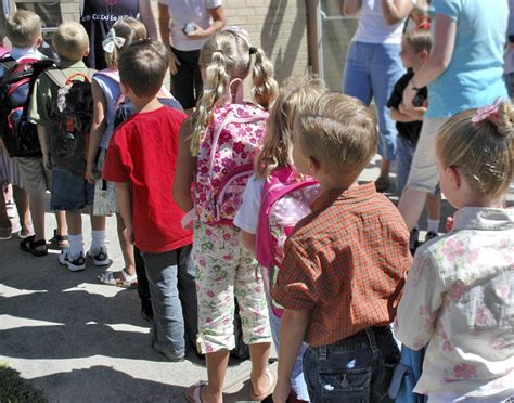 Children Walking In A Straight Line