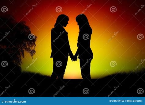 Silhouettes Of Two Lesbian Girls Huging In The Garden Royalty Free