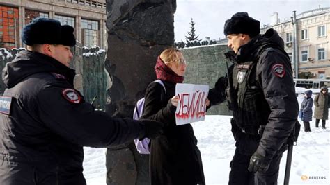 Russian Courts Hand Jail Terms To Dozens Of Navalny Mourners Today