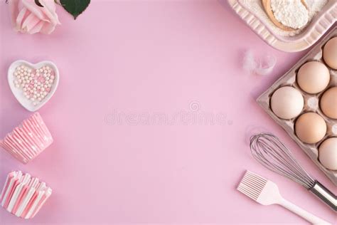 Frame Of Food Ingredients For Baking On Gently Pink Pastel Background