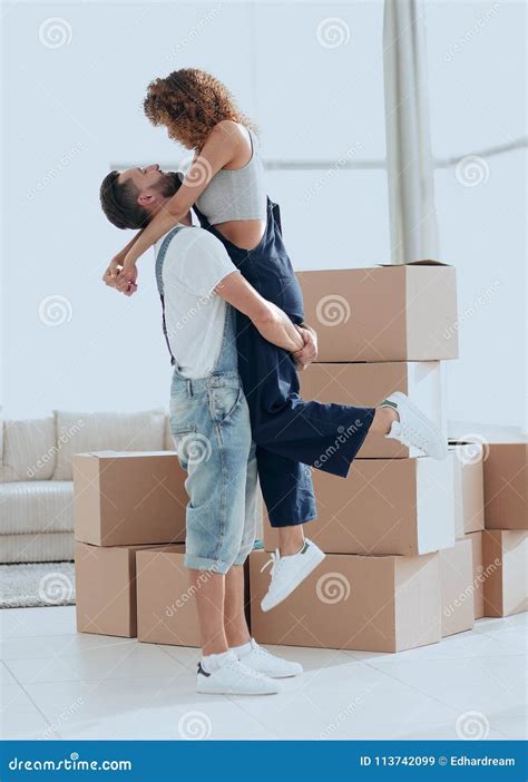 Portrait Of A Happy Couple Moving To A New House Stock Image Image Of