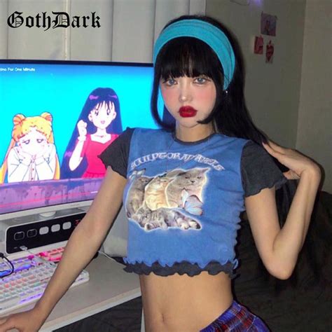 A Woman With Long Black Hair Standing In Front Of A Computer Screen