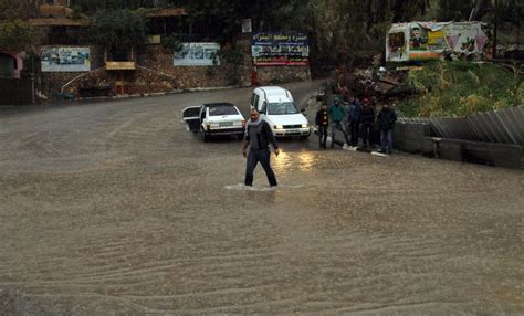 Man Wades Across Flooded Street Near Editorial Stock Photo Stock