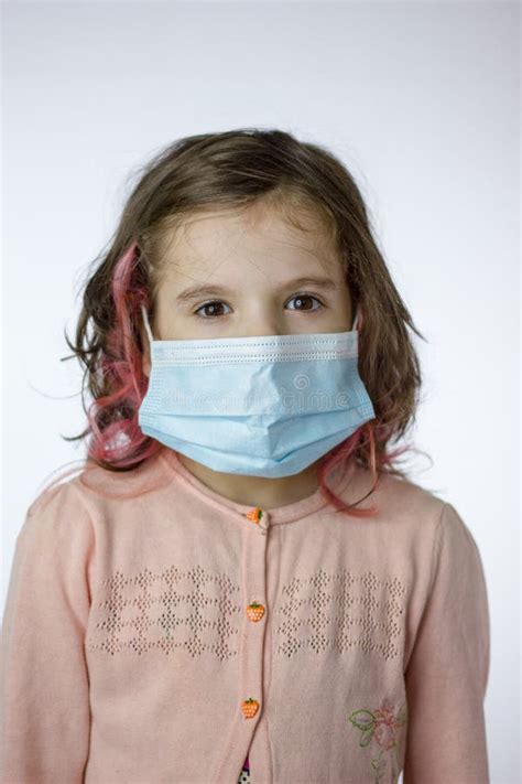 Little Kid Girl with the Mask on Face during Epidemy Stock Image ...