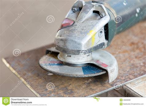 Angle Grinder Tool On Metal Sheet Stock Photo Image Of Metalwork