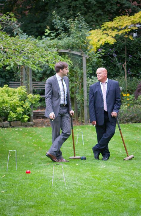 English Garden Croquet Game During A Summer Wedding At Didsbury House