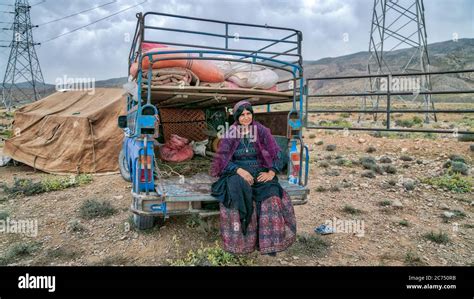 Shiraz Iran May Qashqai Woman Sitting By An Old Car The