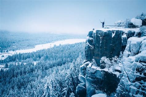 Scene of the Hiker Reached the Top of the Cliff with the Snowy Pine ...