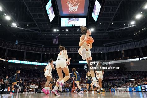 Shay Holle Of The Texas Longhorns Makes A Defensive Rebound During