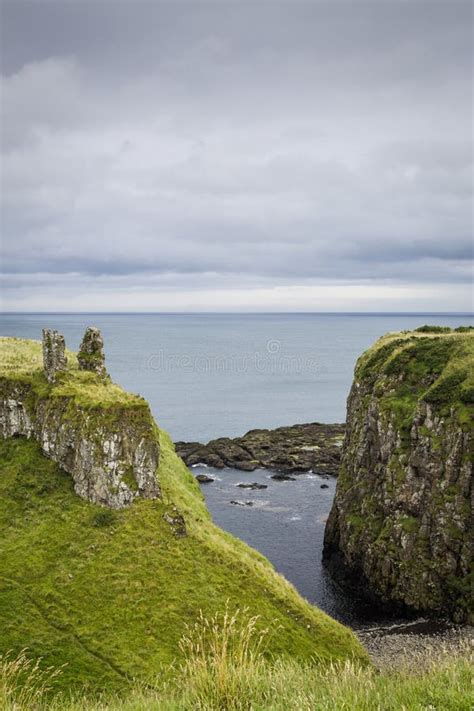 Ruins of Dunseverick Castle Atop Green Cliffs of the Causeway Coast, Northern Ireland Stock ...