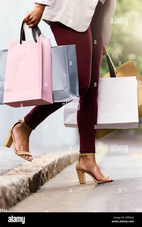 Taking Her Shopping Across The Road An Unrecognizable Young Woman