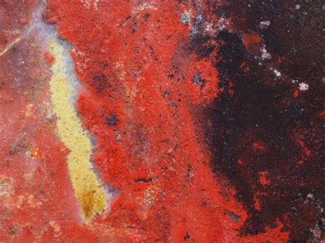 Un Fondo Texturizado De Pintura Roja Y Negra Con Una Textura De Pintura