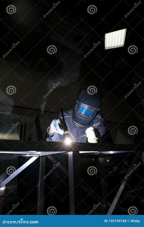 View Of Man In Face Shield Doing Argon Welding Stock Photo Image Of