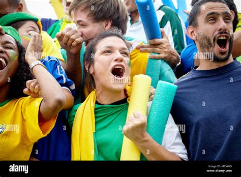 Brazilian football fans celebrating victory at football match Stock ...