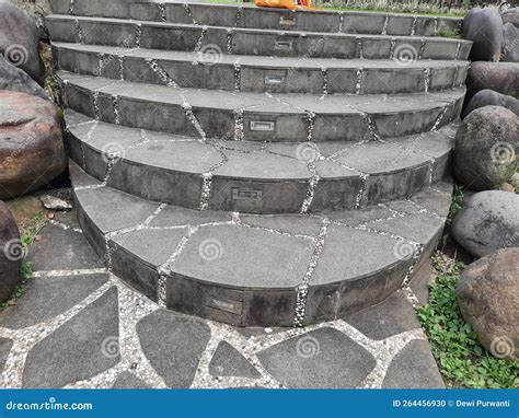 Stone steps in the garden stock photo. Image of flooring - 264456930