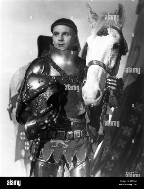 LAURENCE OLIVIER Portrait in Armour in HENRY V 1944 director LAURENCE OLIVIER play William ...