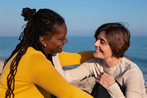 Premium Photo Medium Shot Lesbian Couple At Seaside