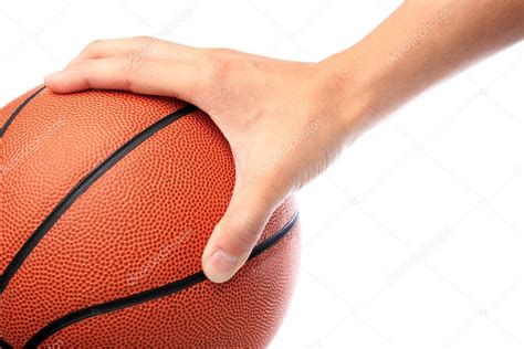 Basketball hold by one hand Stock Photo by ©leungchopan 3038540