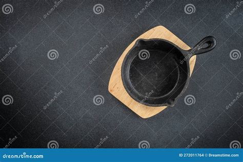 Empty Cast Iron Pan Cooking Concept On A Dark Background Stock Photo