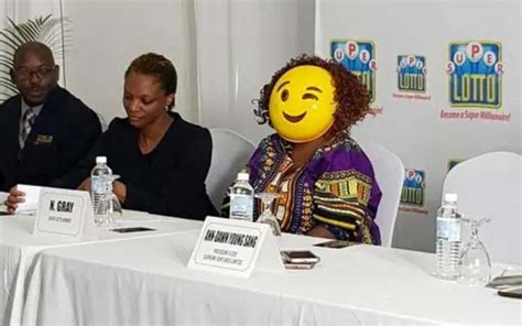 Multi-million jackpot winner collects cheque in emoji mask