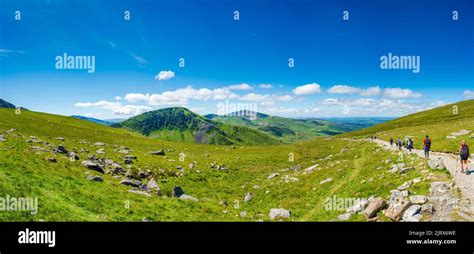 SNOWDON, WALES - JULY 09, 2022: Hikers walk down from Mount Snowdon ...