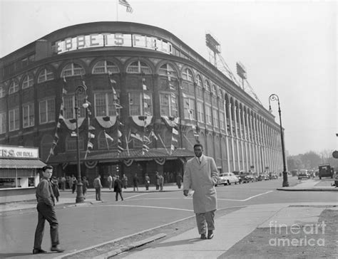 Jackie Robinson Leaving Ebbets Field by Bettmann