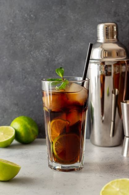 Premium Photo Cocktail Cuba Libre With Lime And Ice Rum And Cola