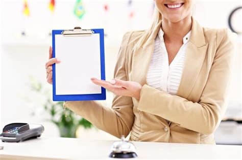 Premium Photo Happy Receptionist Working In Hotel