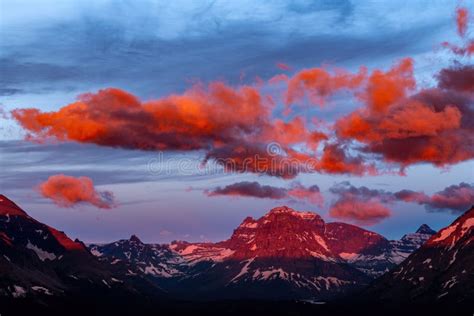 Dramatic Sunrise Over High Mountain Peaks In Montana Stock Image