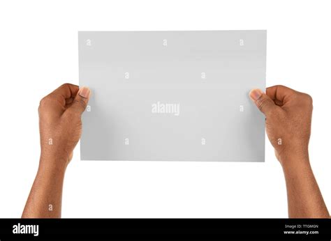 Male Hands Holding Sheet Of Paper Isolated On White Stock Photo Alamy