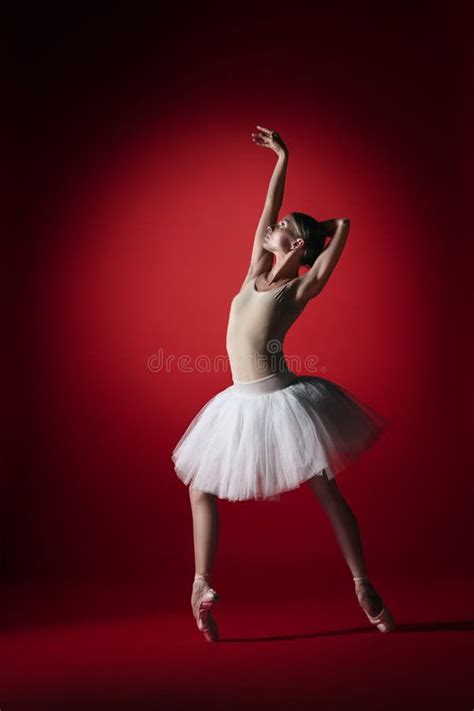 Ballerina Young Graceful Female Ballet Dancer Dancing At Red