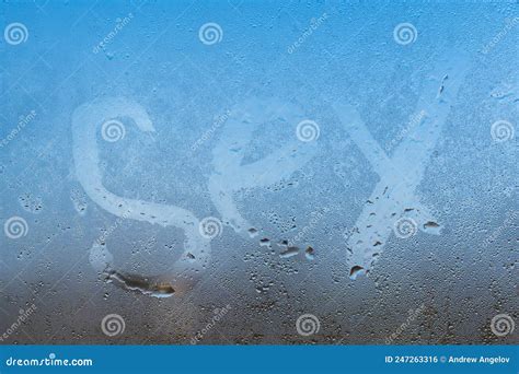 Closeup Sign Of Sex On The Foggy Window Glass With Dripping Drops Condensated Background