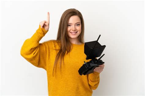 Chica Adolescente Sosteniendo Un Control Remoto De Drone Sobre Fondo