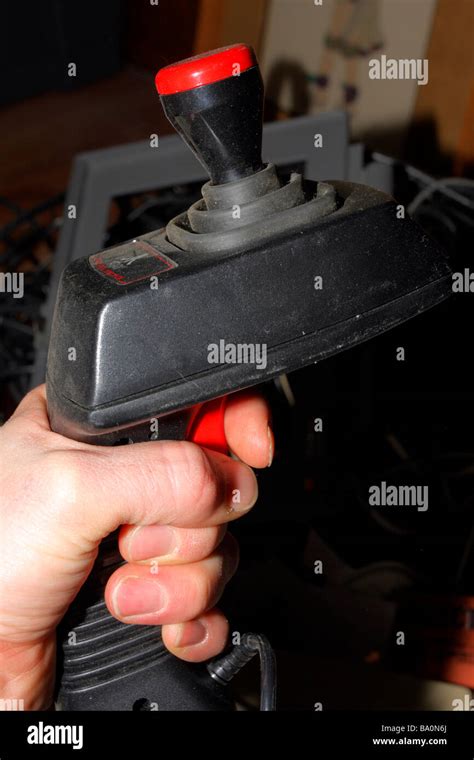 Hand Holding Black Plastic Atari Joystick Controller 1980s Stock Photo