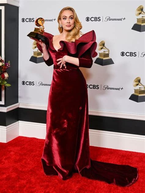 Adele makes her jaw-dropping return to Grammys in figure-hugging velvet ...