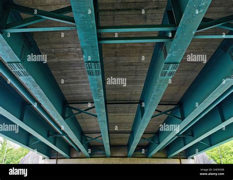 The Underside Of A Plate Girder Bridge With Turquoise I Beams England